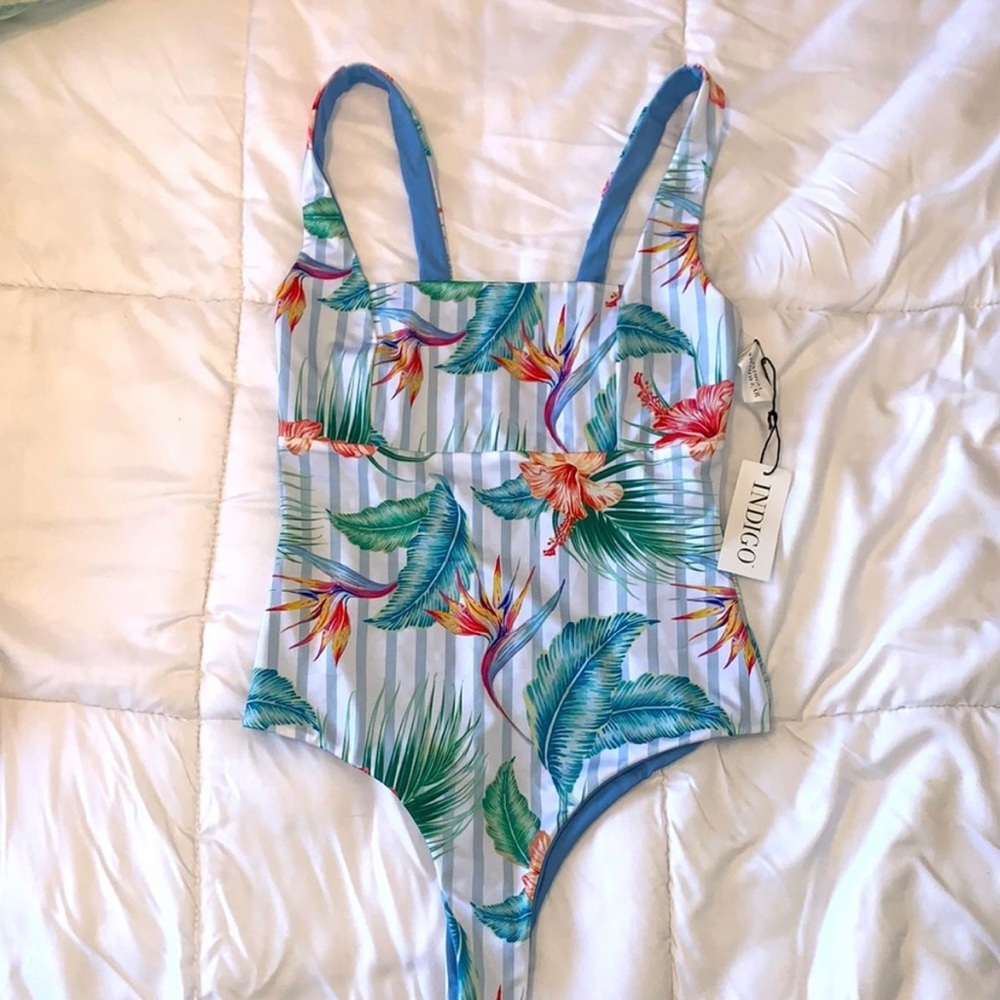Brand new Indigo cheeky one piece
"Traveler"